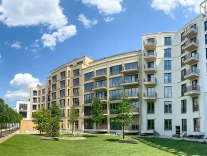 Residential area with ecological and sustainable green residential buildings, low-energy houses with apartments and green courtyard